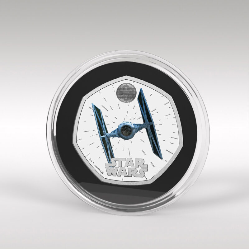 Star Wars coin featuring TIE Fighter design.